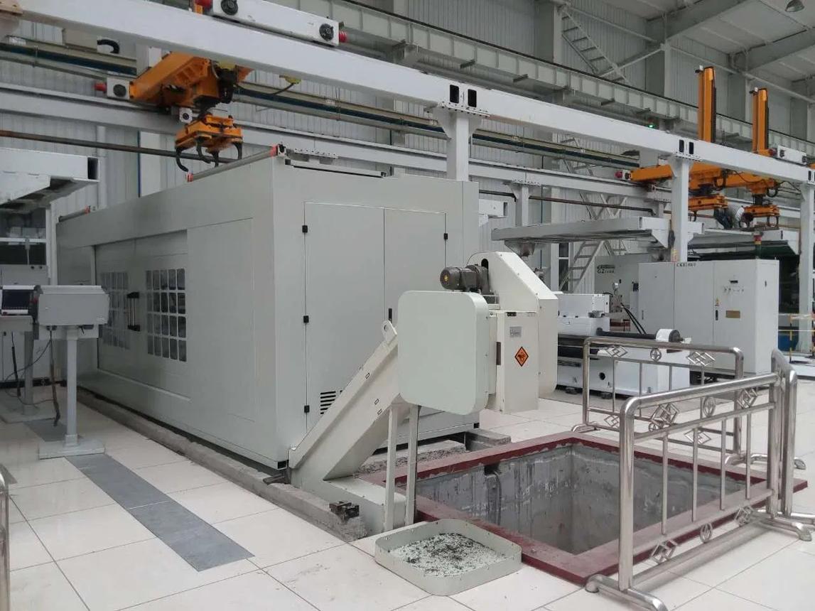 Machining center with automatic workpiece feed on the shop floor.